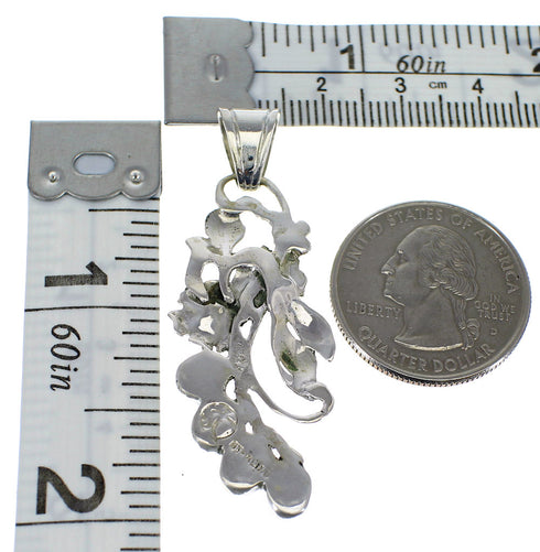 Sterling Silver And Turquoise Flower Pendant AX49585